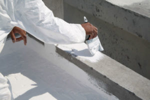 Brushing silicone roof coating